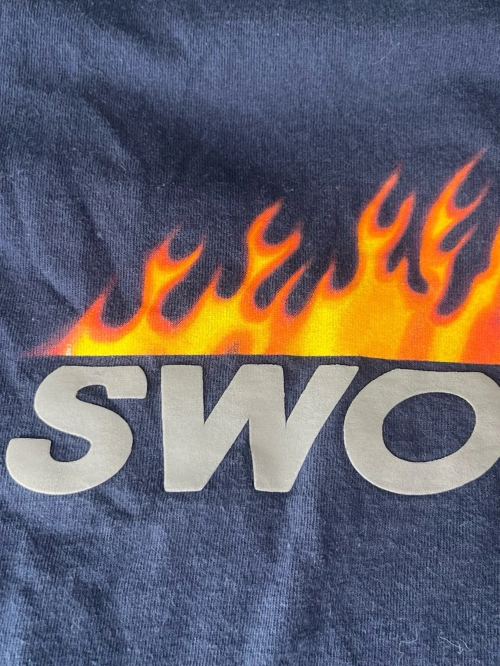 Vintage Nike Kids Navy Long Sleeve Tee with Flame 'Swoosh' Graphic